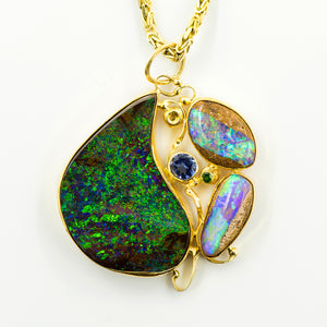 australian-boulder-opal-petrified-wood-tanzanite-tsavorite-pendant-Jennifer-Kalled