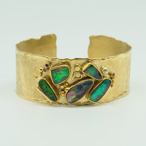 Jennifer-Kalled-Australian-boulder-opal-18k-gold-cuff-bracelet
