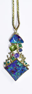 boulder opal peridot tanzanite emerald blue zircon ruby pendant 22k gold kalled
